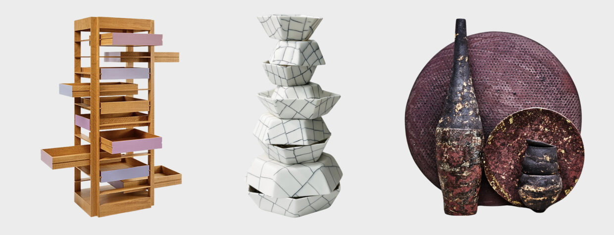 Artisan_Affair_Header_2 - Deutsche Manufakturenstrasse Holzregal mit bunten Schubladen, gestapelte Keramikschalen mit grafischem Muster und dekorative Gefäße auf einem runden ...