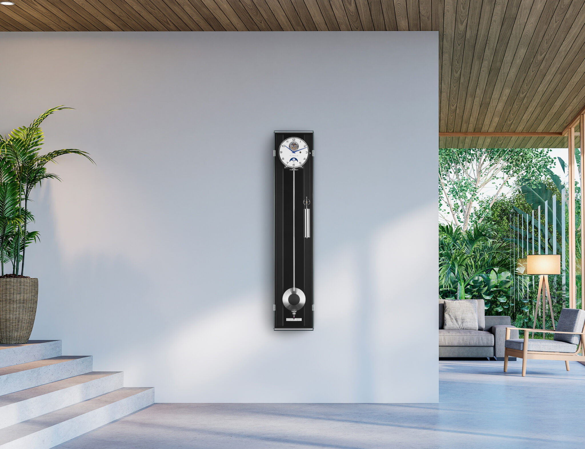 71011-740761_ambiance 5 - Deutsche Manufakturenstrasse Wanduhr mit schwarzem Ziffernblatt und Pendel, an einer hellen Wand in einem modernen Raum mit Pflanzen und Möbeln.